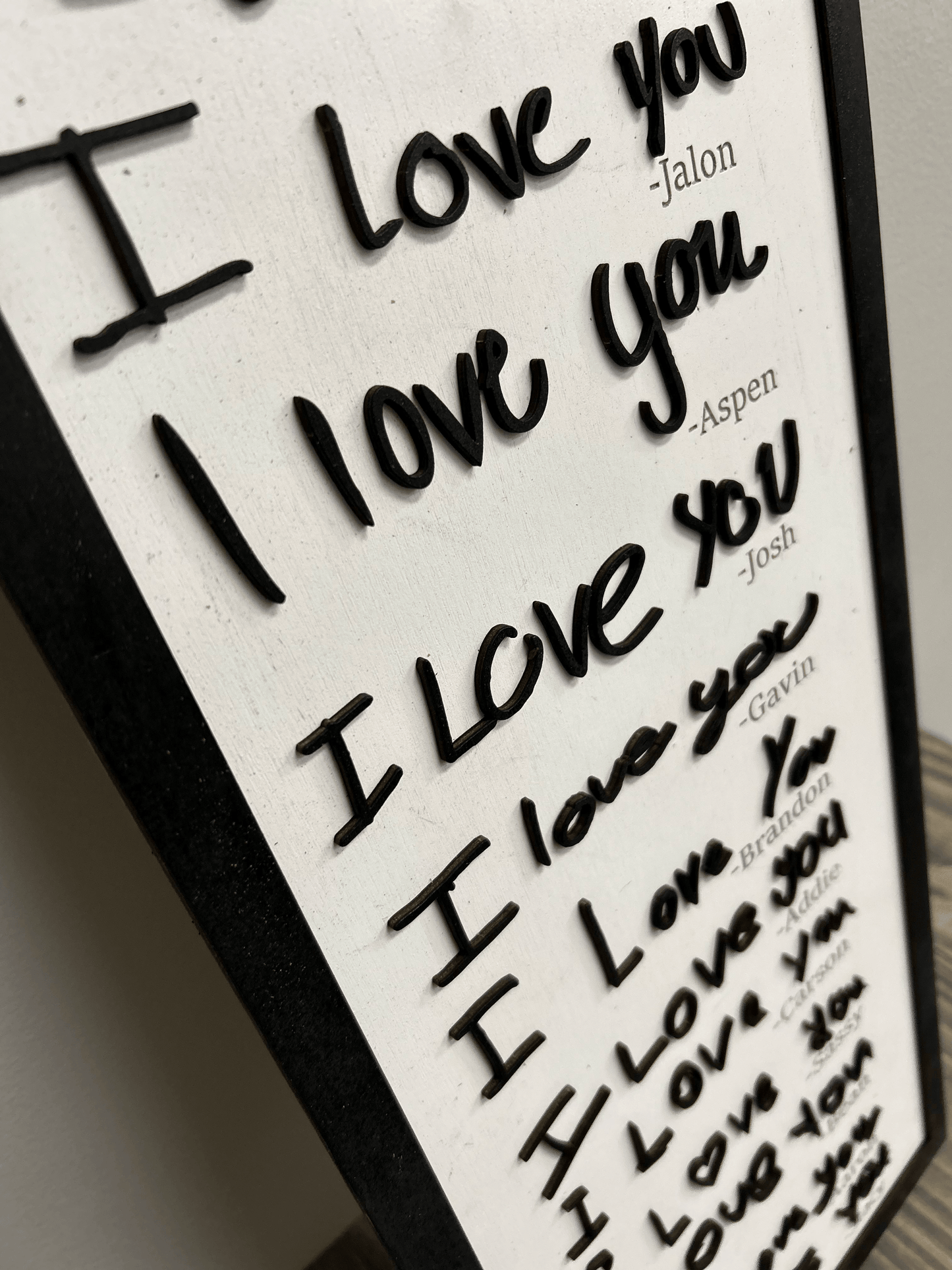 A neatly crafted signature in a handwriting style, displaying unique acrylic lettering characteristics