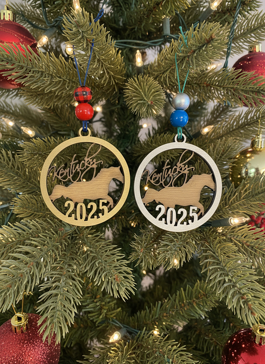Kentucky horse 2025 ornaments on Christmas tree with red and blue beads