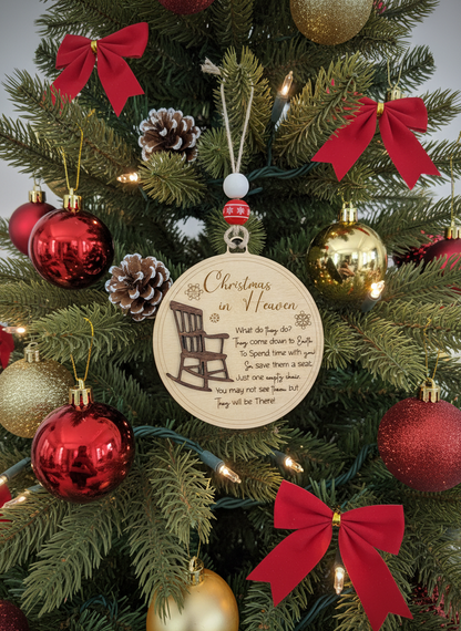 Christmas in Heaven ornament with rocking chair hanging on decorated Christmas tree