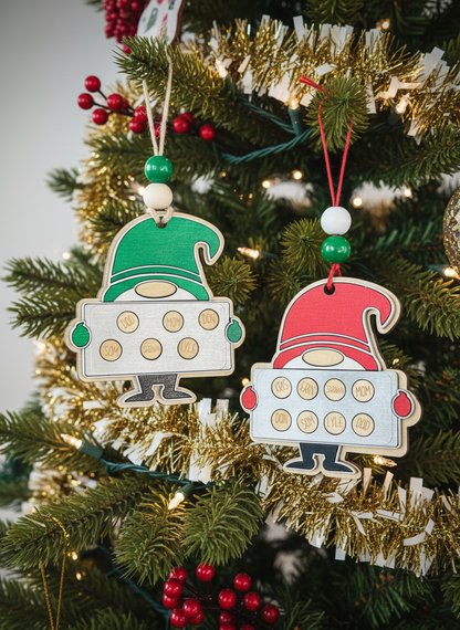 Wood gnome family cookies ornaments with names hanging on Christmas tree