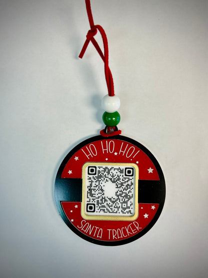 Santa Tracker ornament with QR code, red ribbon, and festive green and white beads