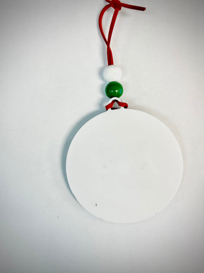 Blank round white Christmas ornament with red string and green and white beads