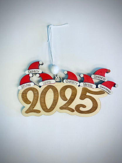 2025 wooden family ornament with red Santa hats labeled Selina, April, Christy, Brian, Amanda, Christopher