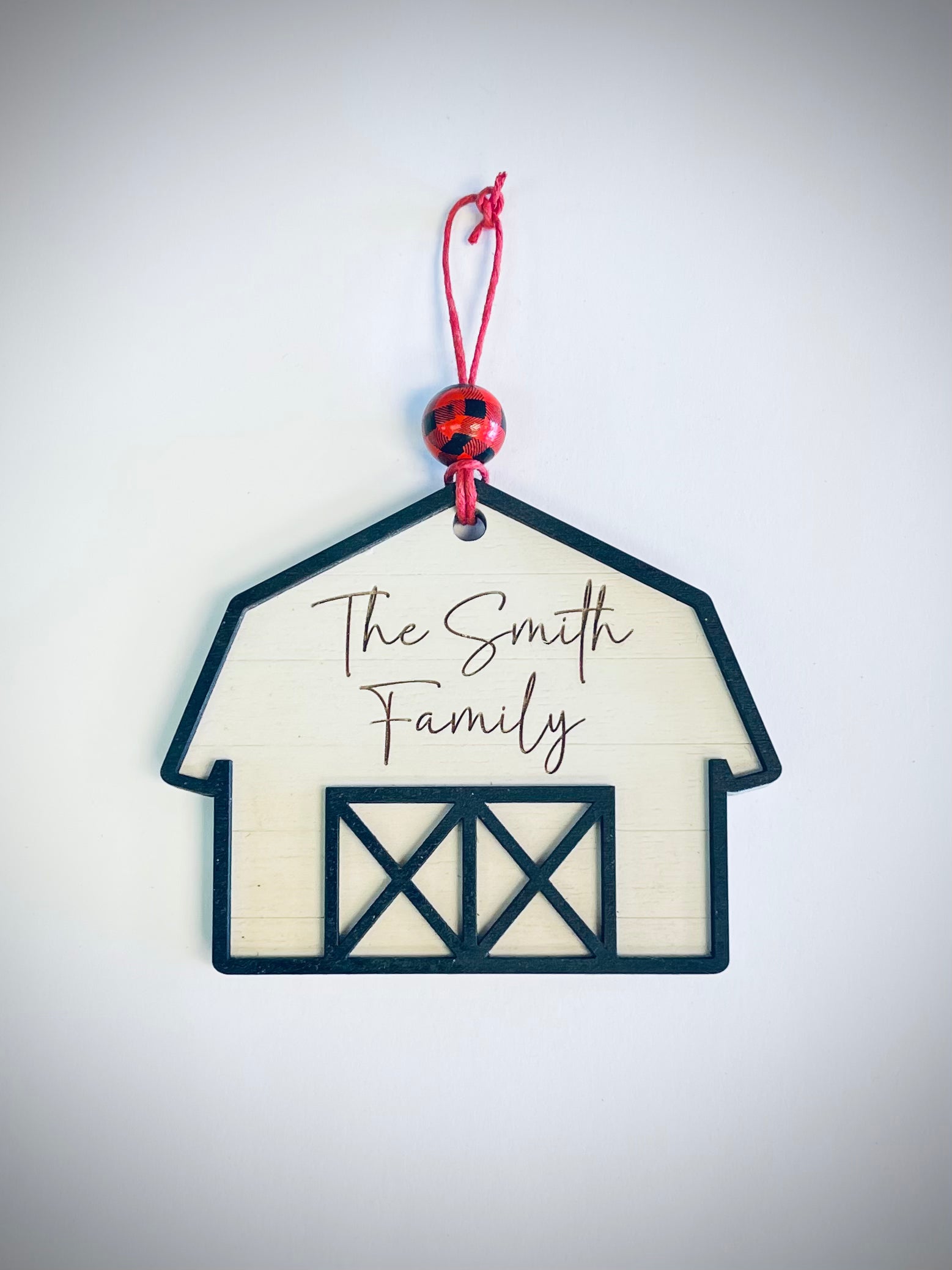 Farmhouse barn ornament with red plaid bead and custom family name