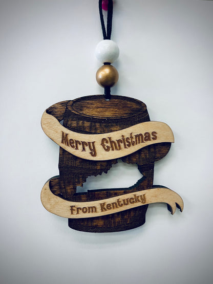 Wooden Kentucky bourbon barrel Christmas ornament with engraved Merry Christmas text