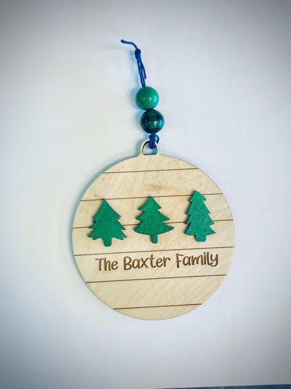 Personalized wood Christmas ornament with three green trees and decorative beads