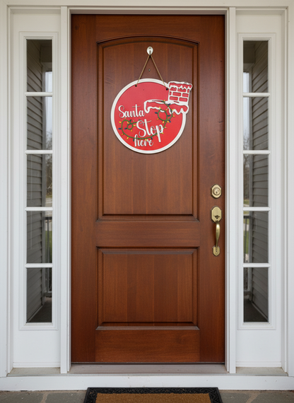 Red Santa Stop Here Christmas door hanger on a wooden front door